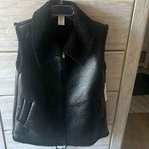 Black faux leather sherling vest. Brand new